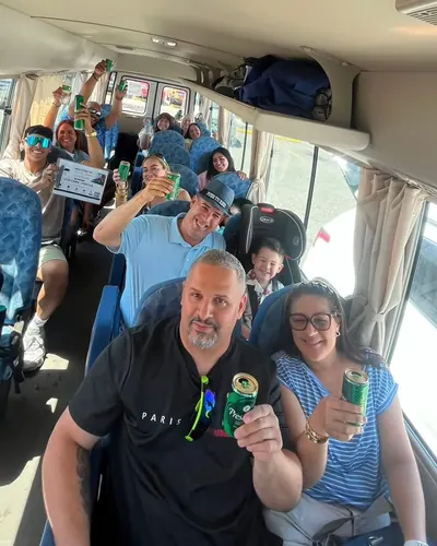 Group of friends toasting inside our Sprinter