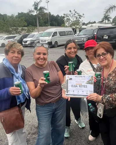 Group of friends welcomed at the airport with a welcome drink